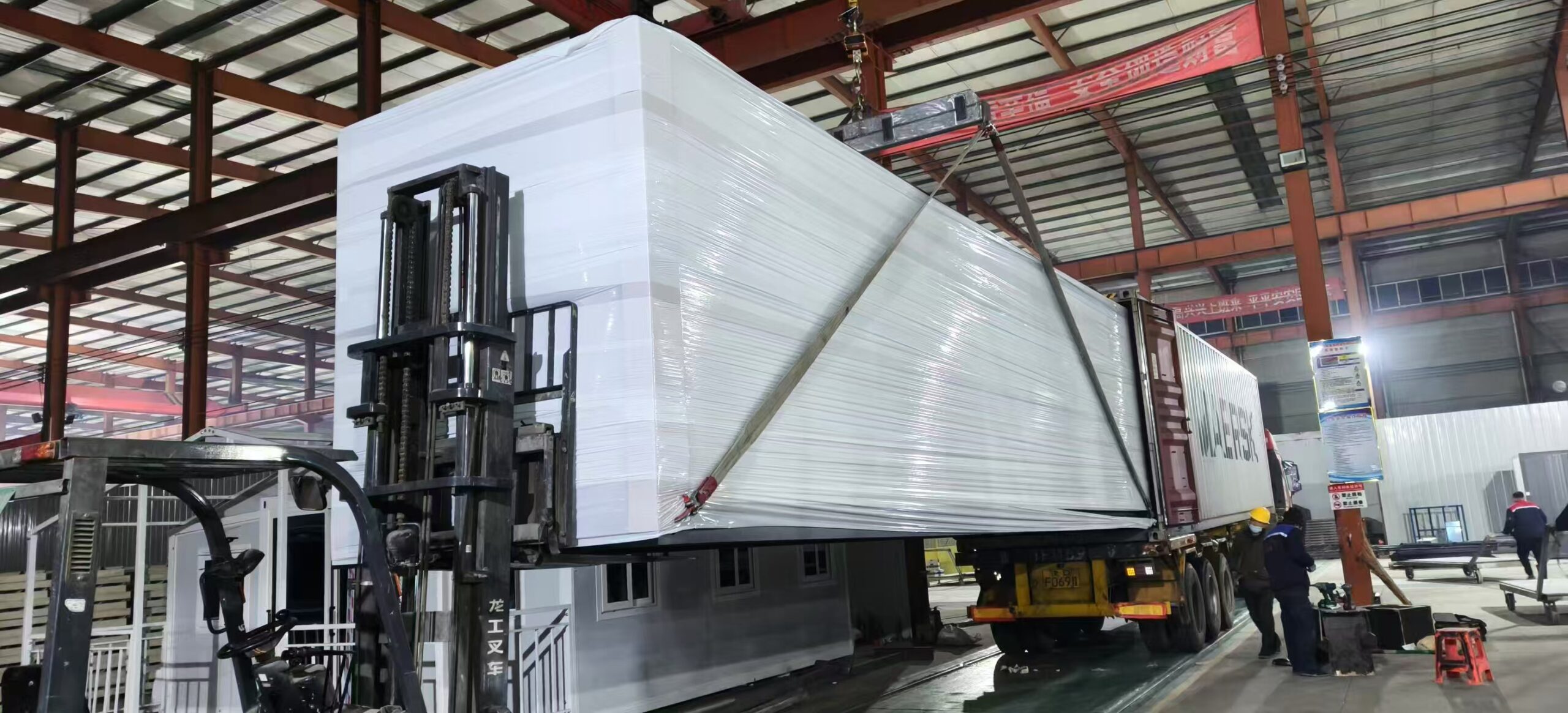 30FT prefab house being loaded for shipment to Spain