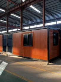 30ft red wood grain double wing expandable house with black frame