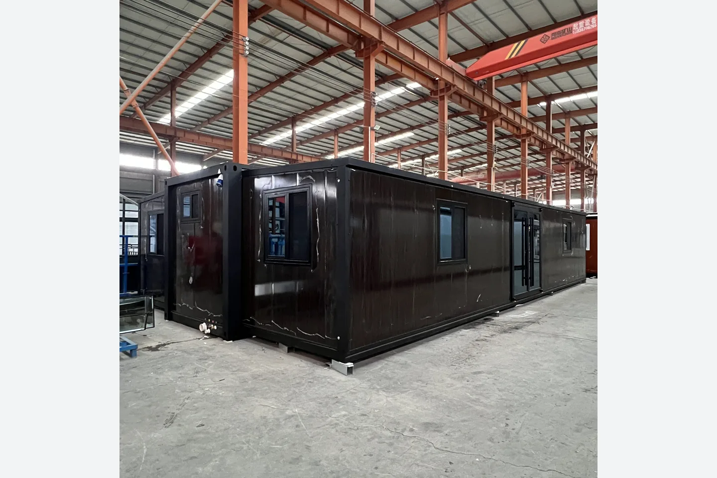 40ft black walnut expandable container house with black steel frame in factory