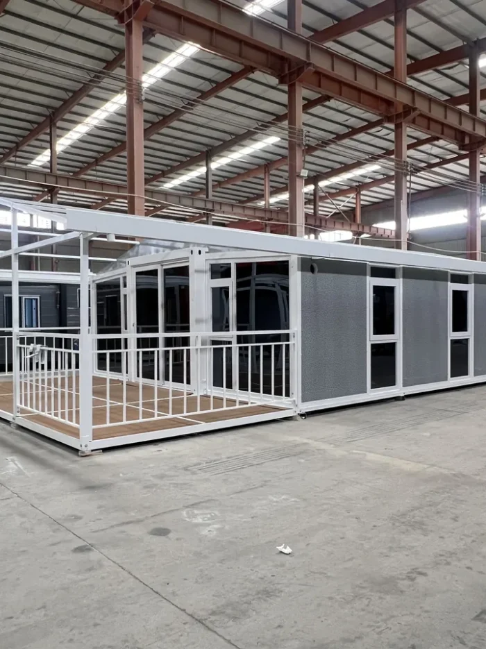 40ft Gray Expandable House with Veranda - Factory View 40ft gray expandable container house with white frame and front veranda