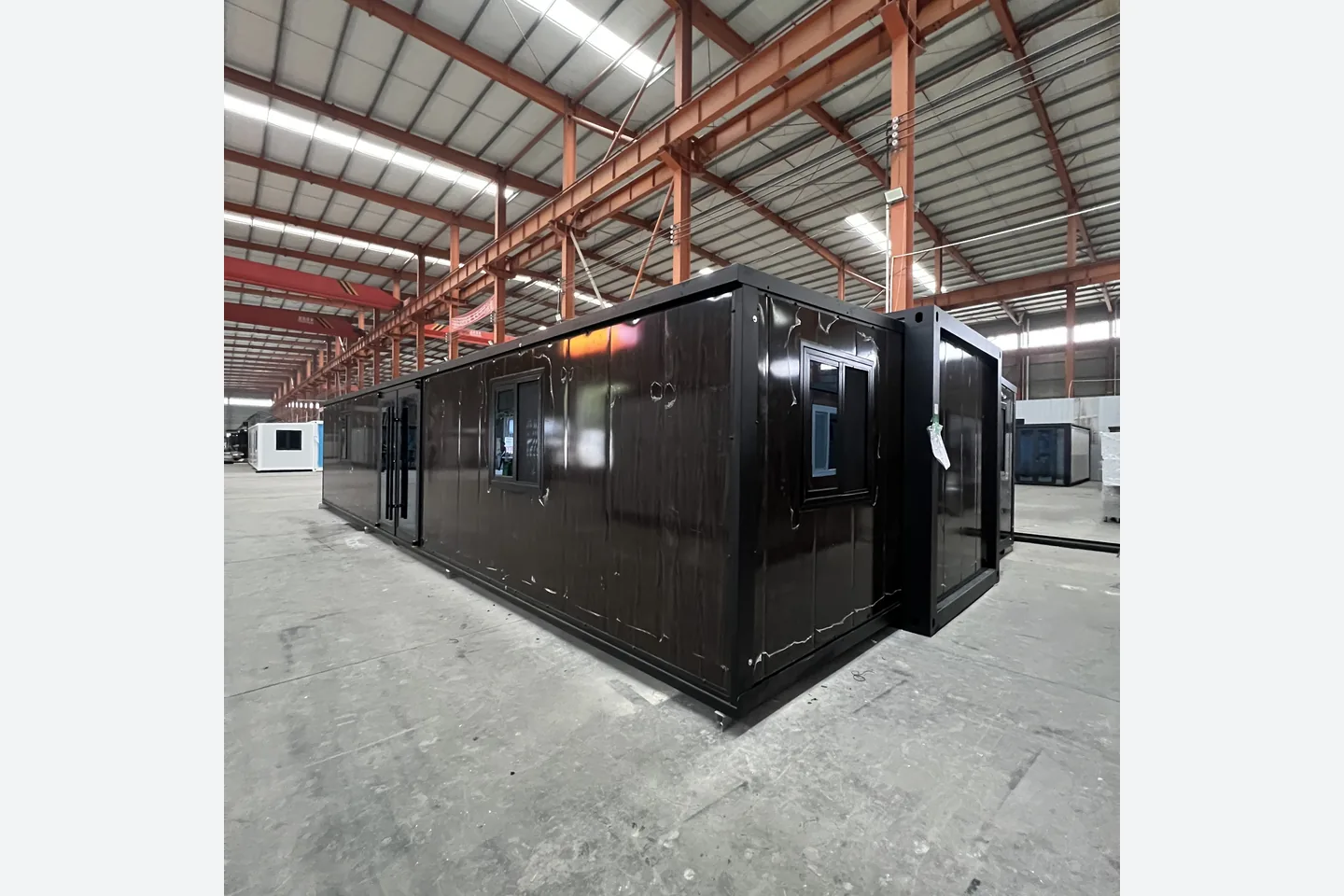 40ft modular container home with black frame and walnut finish