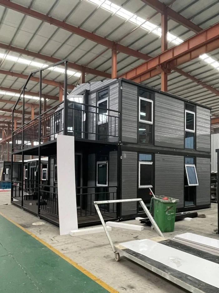 double-storey-folding-house Two-storey foldable container house prefab building - view 3