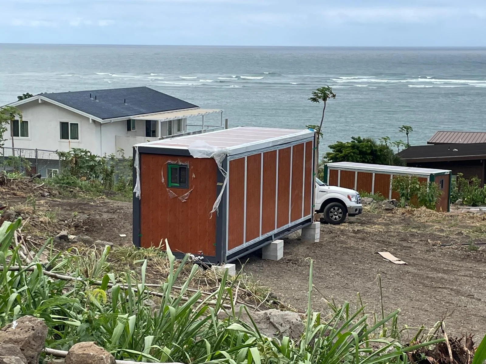 Customer-installed 20ft prefab folding house at a coastal site in Guadeloupe