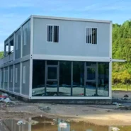 glazed end facade of a two-storey modular container office building in Indonesia