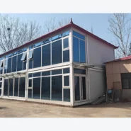 corner view of a two-floor quick-assembly container building with opening windows and glass facade