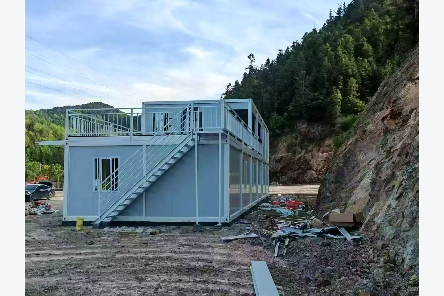 external staircase and upper terrace on a two-storey quick-assembly container building