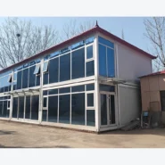 two-storey quick-assembly container building with glass facade for modular offices