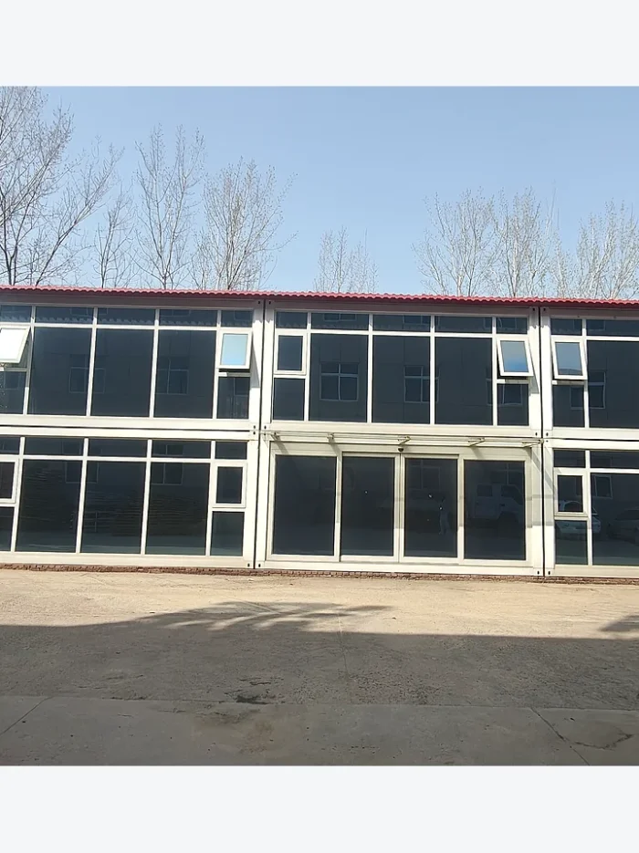 front view of a two-storey quick-assembly container building with multiple glass-fronted units
