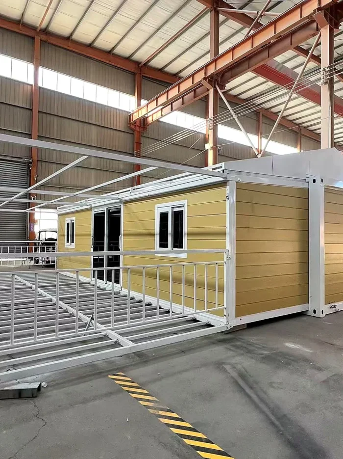 yellow-expandable-house-patio-angle-02 30ft expandable container house for camp office and residential use - view 2
