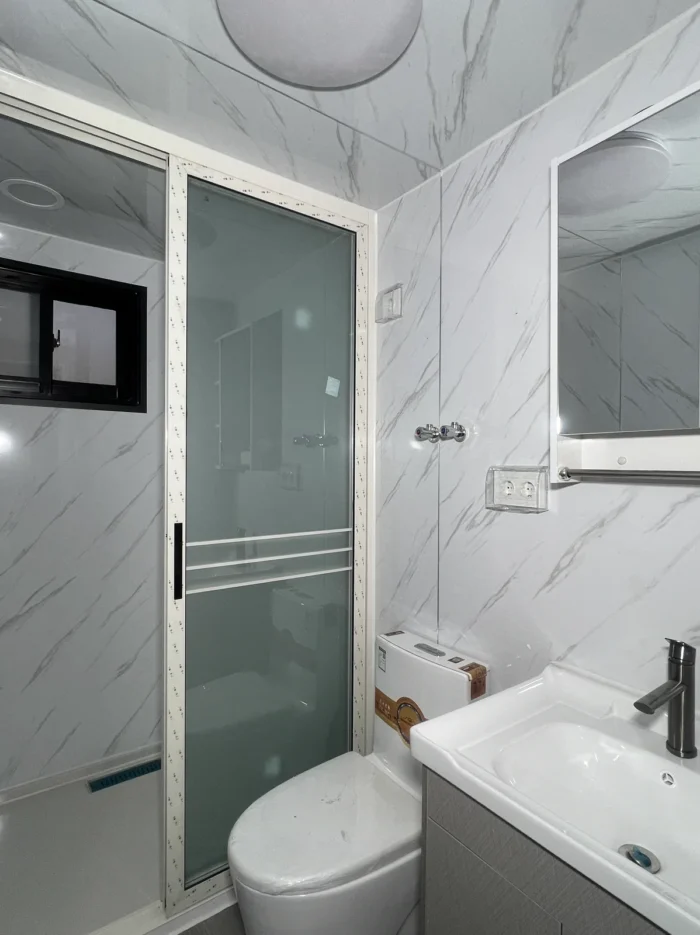 20ft expandable house bathroom shower Bathroom with toilet washbasin and shower in a 20ft expandable house