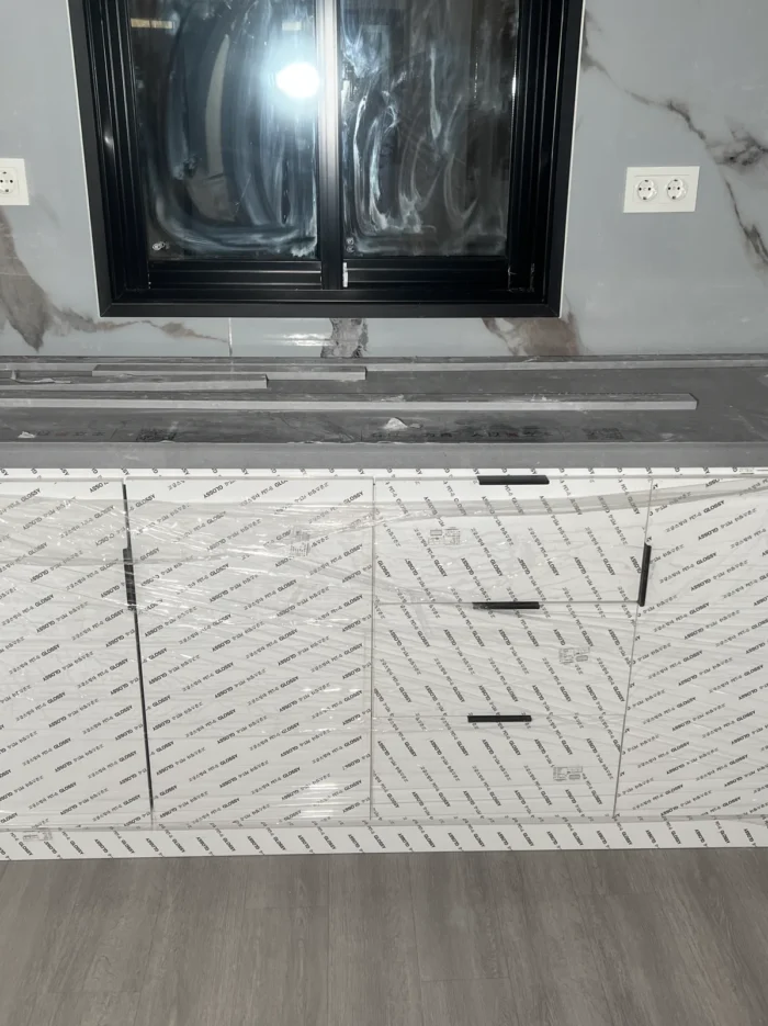20ft expandable house kitchen cabinets Kitchen cabinets and worktop in a 20ft expandable container home