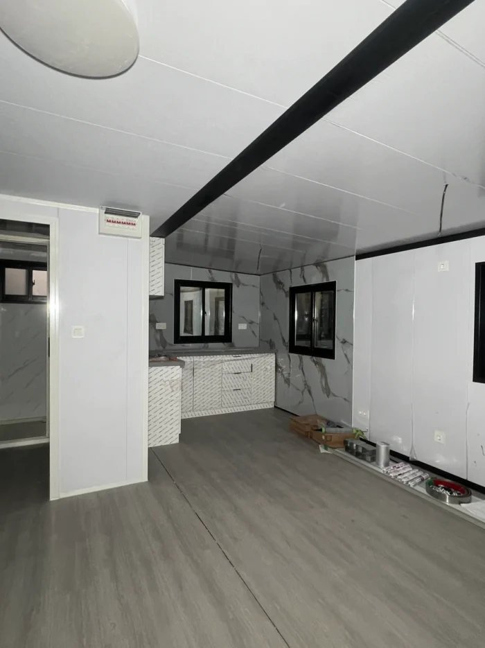 20ft expandable house living kitchen Interior living area and kitchen of a 20ft expandable house