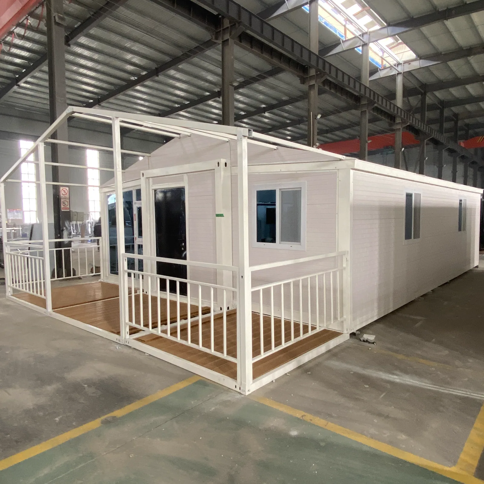 40ft expandable container house with covered veranda and white exterior