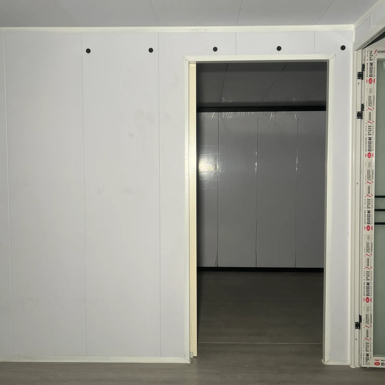 Bedroom partition and doorway inside a 20ft expandable prefab home