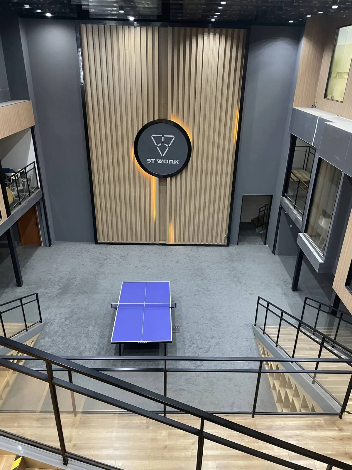 Multi-level office atrium and employee recreation area